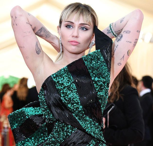 Guia de tatuagem de Miley Cyrus