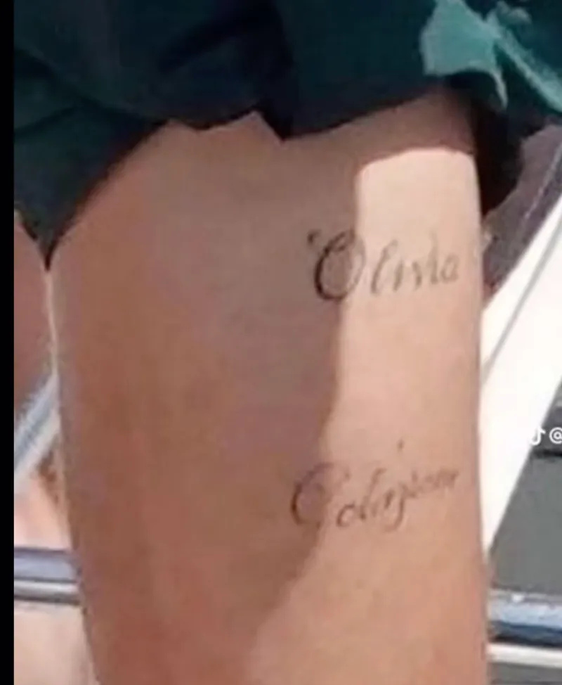   Foto Harry Stylesist' leg with tattoos that read Olivia and Colazione