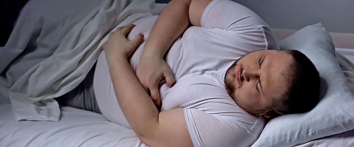 Debelost in spanje